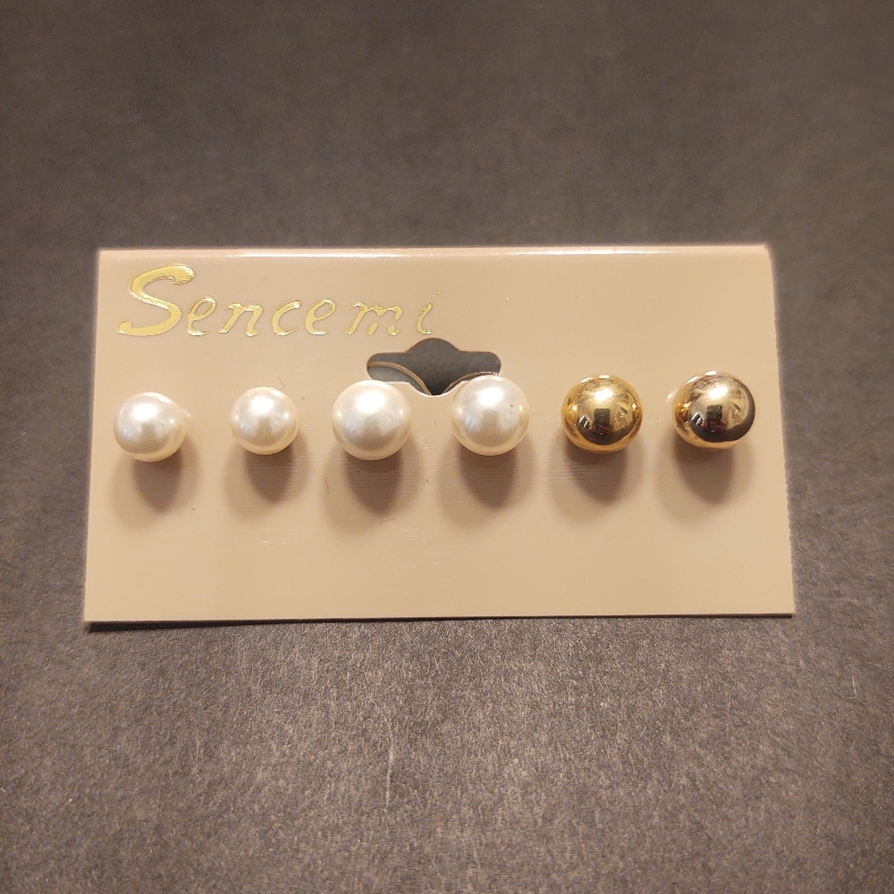 Three pairs of pearl earrings